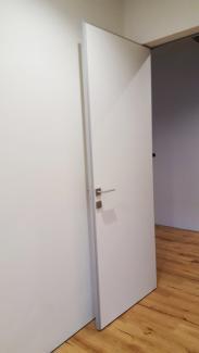 Двері прихованого монтажу під фарбування INSIDE з алюмінієвими торцями 